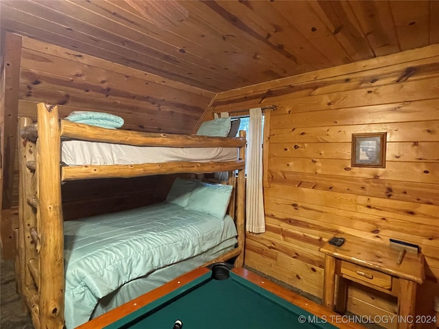 bedroom with wooden ceiling, wood walls, vaulted ceiling, and billiards