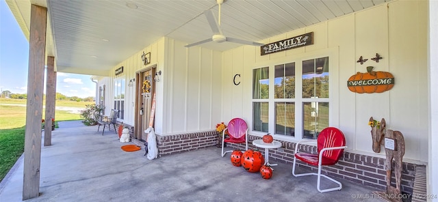 view of patio / terrace with ceiling fan and a porch