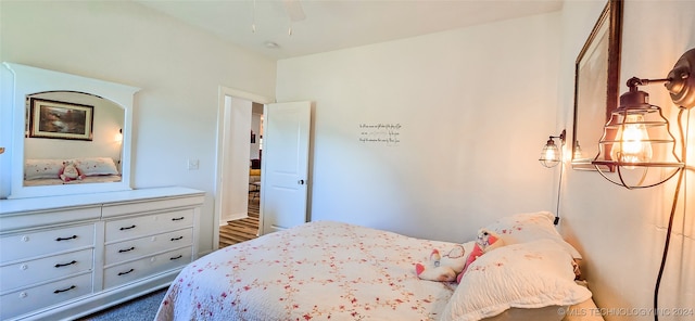 bedroom featuring dark hardwood / wood-style flooring