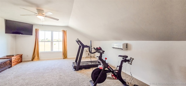 exercise room featuring lofted ceiling, ceiling fan, and light colored carpet