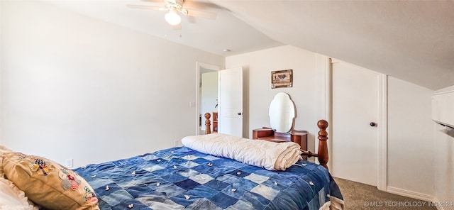 bedroom with carpet, vaulted ceiling, and ceiling fan