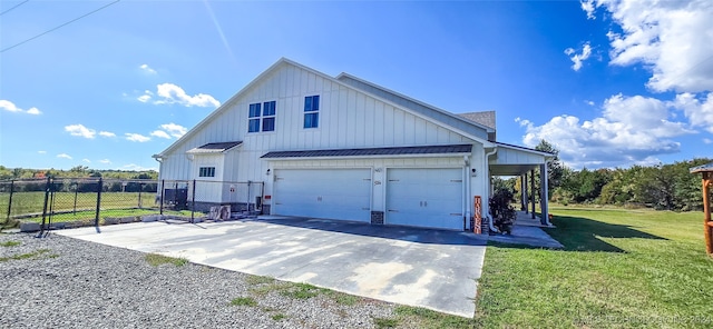 exterior space with a garage and a yard