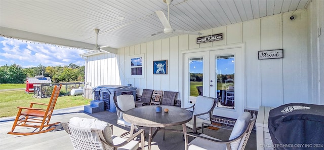 view of patio featuring ceiling fan