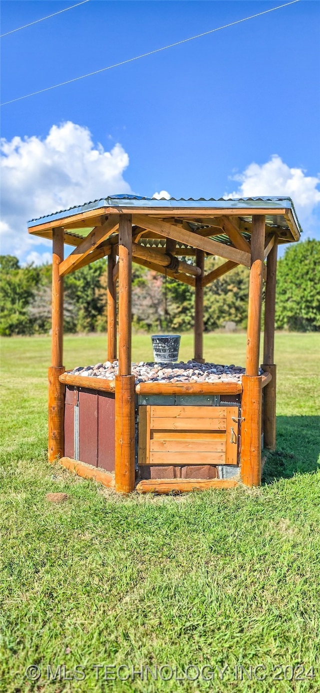 view of outbuilding featuring a gazebo and a yard