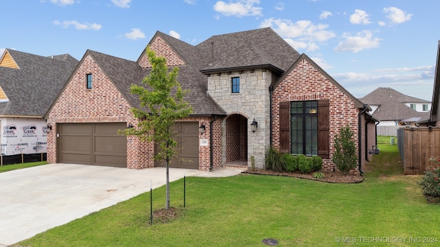 view of front of home with a front lawn