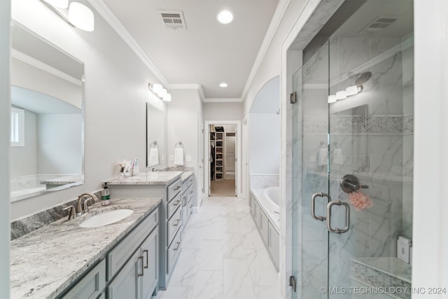 bathroom with crown molding, vanity, and separate shower and tub