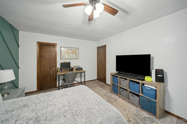 bedroom featuring ceiling fan and light hardwood / wood-style floors