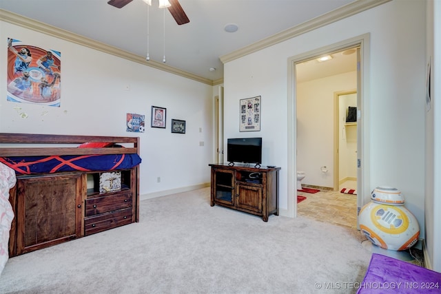 interior space with ensuite bath, ceiling fan, and crown molding