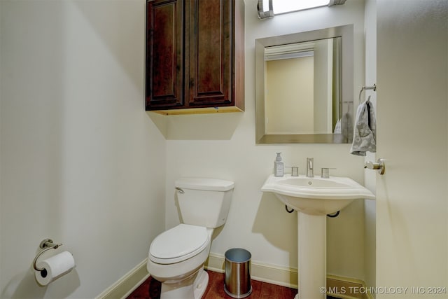 bathroom featuring toilet