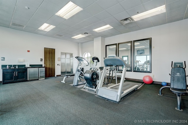 exercise room featuring carpet floors