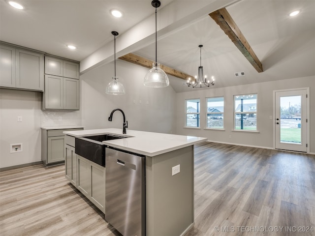 kitchen featuring hanging light fixtures, sink, a kitchen island with sink, stainless steel dishwasher, and light wood-type flooring