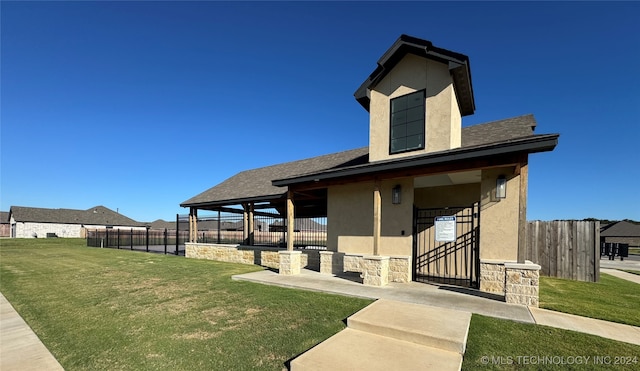 exterior space with a yard