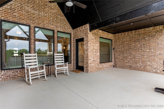 view of patio featuring ceiling fan