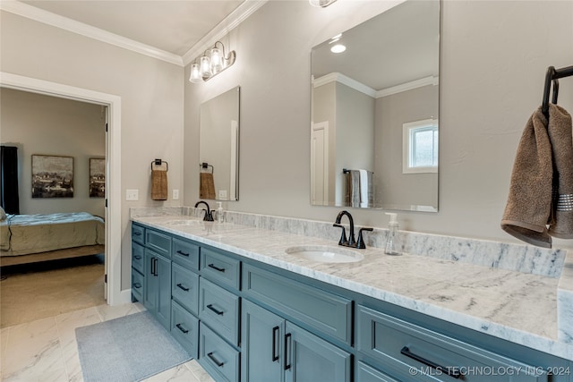 bathroom featuring ornamental molding and vanity