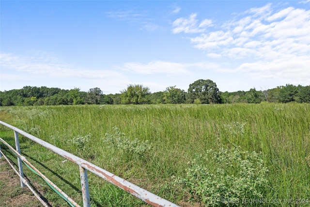 exterior space with a rural view