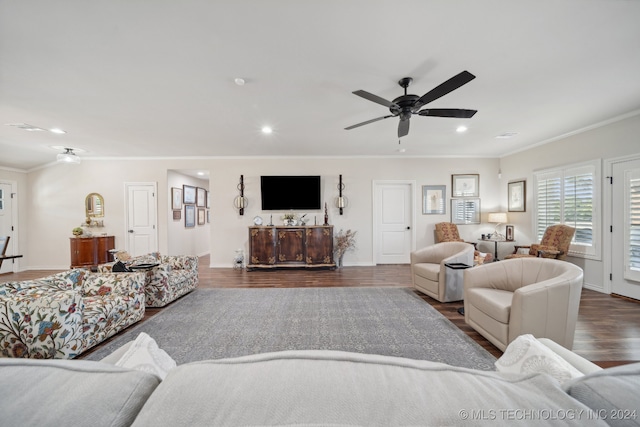 living room featuring ornamental molding, dark hardwood / wood-style floors, and ceiling fan