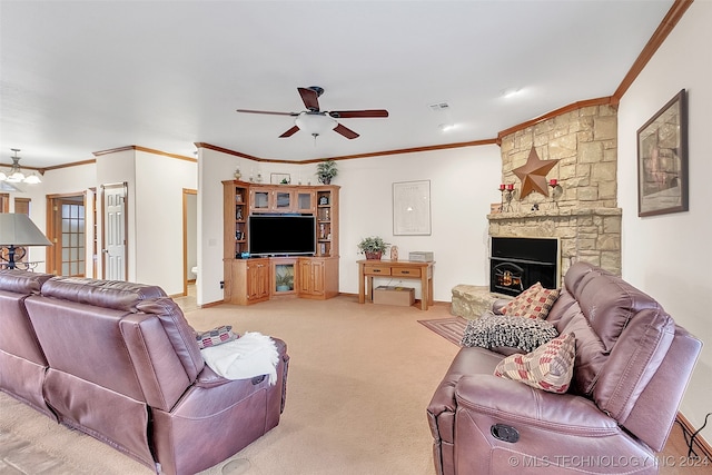 carpeted living room featuring ornamental molding, ceiling fan, and a fireplace