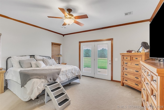 carpeted bedroom with ceiling fan, crown molding, and access to exterior