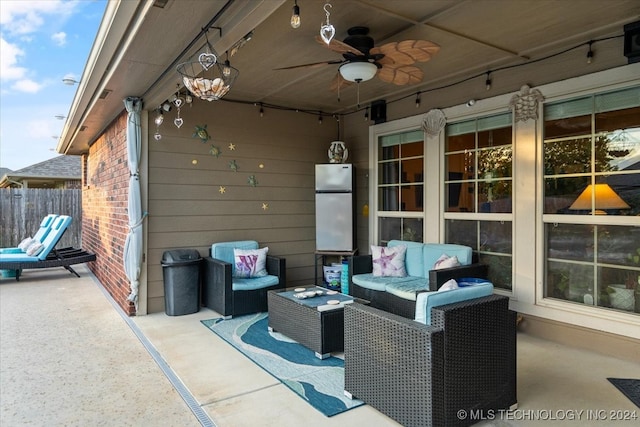 view of patio featuring ceiling fan and outdoor lounge area