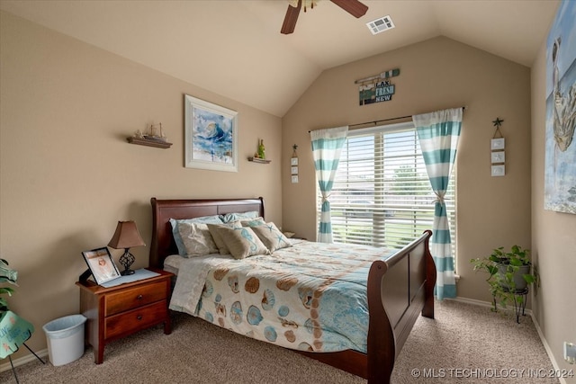 carpeted bedroom featuring lofted ceiling and ceiling fan