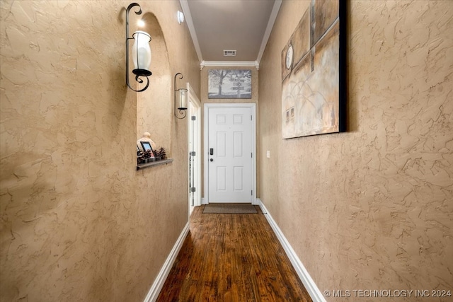 corridor featuring crown molding and wood-type flooring