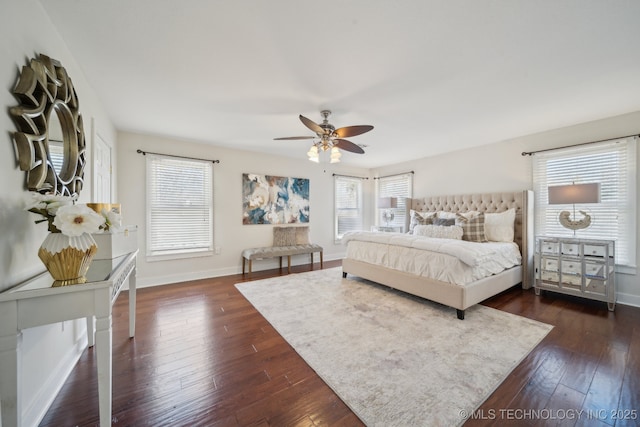 bedroom with dark wood finished floors, baseboards, and ceiling fan