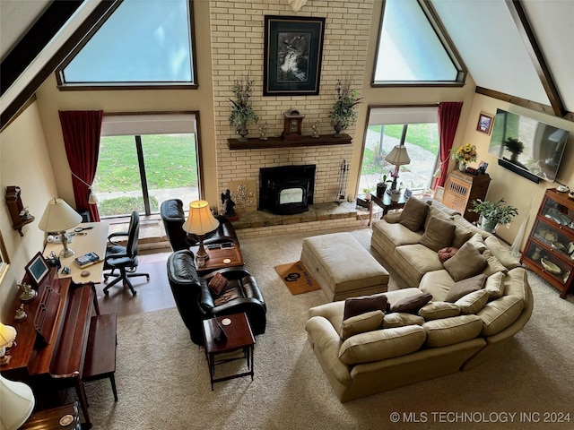 living room with beamed ceiling, a healthy amount of sunlight, and high vaulted ceiling