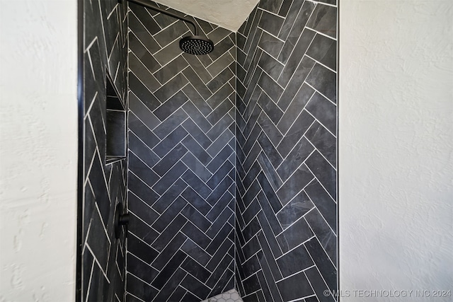 room details with a tile shower