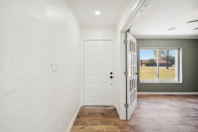 18440 County Road 3564, Ada, OK 74820 - foyer entrance with crown molding, wood finished floors, ceiling fan, and a textured wall