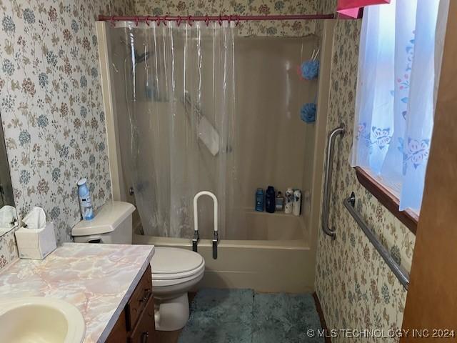 1384 Academy Rd, Bennington, OK 74723 - full bath with wallpapered walls, vanity, toilet, and shower / bath combo with shower curtain