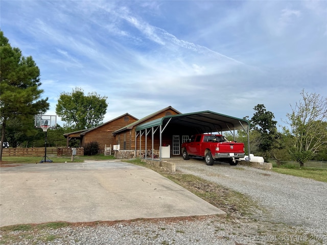 view of front of home featuring a carport