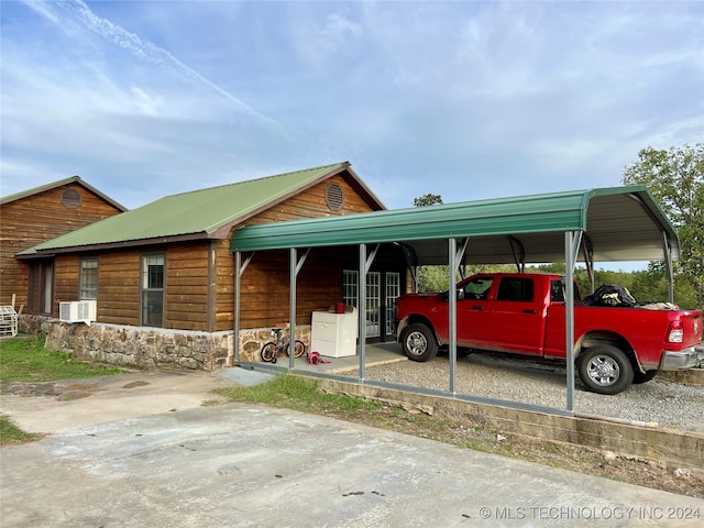 view of parking with a carport