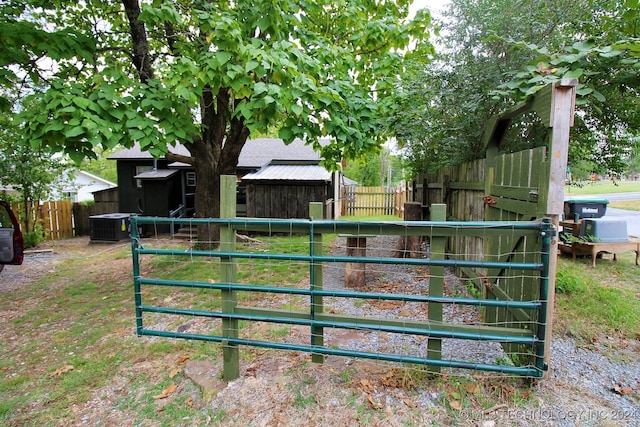 view of gate featuring central AC