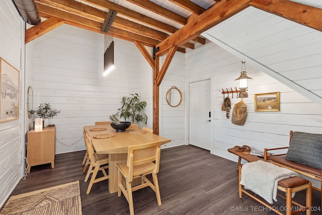 dining space with beamed ceiling, wooden walls, dark hardwood / wood-style floors, and wooden ceiling