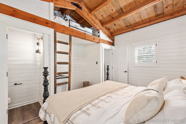 bedroom featuring wooden ceiling, wood walls, lofted ceiling with beams, and dark hardwood / wood-style floors