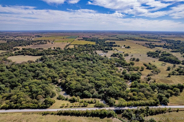 birds eye view of property featuring a rural view