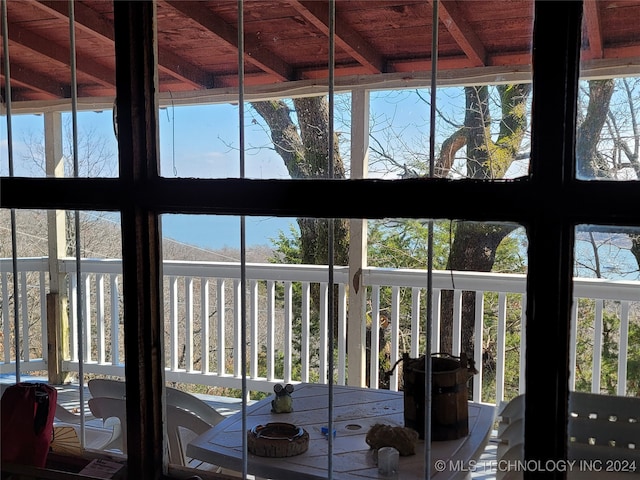 details with wood ceiling and beamed ceiling