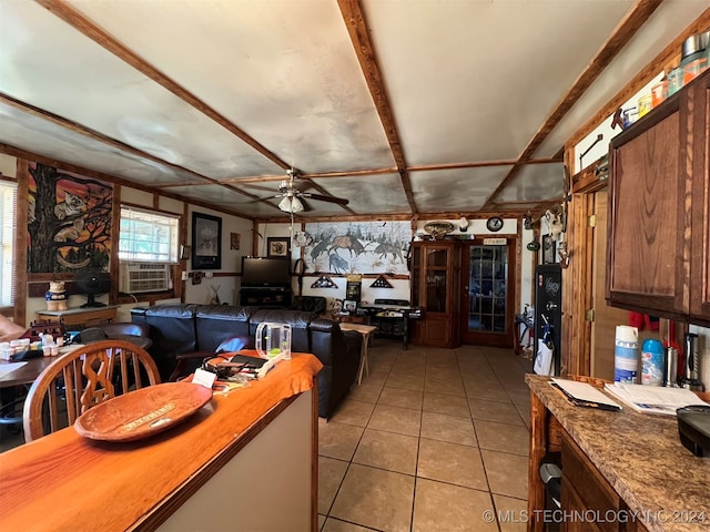 kitchen featuring ceiling fan and light tile patterned flooring