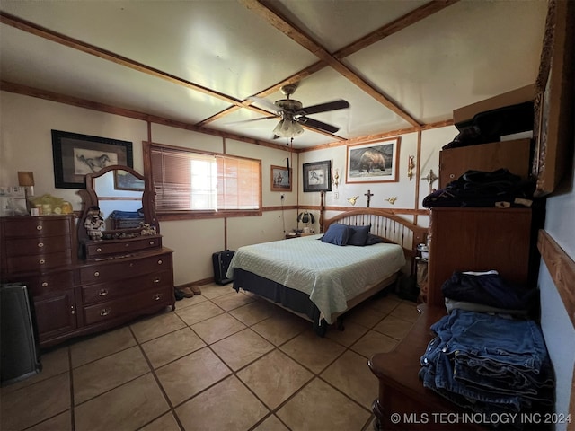 bedroom with ceiling fan and light tile patterned floors