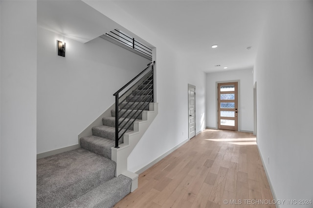 foyer entrance featuring light wood-type flooring