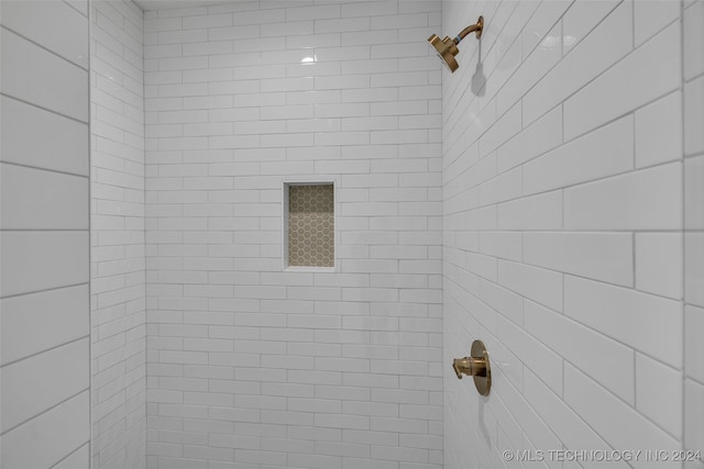 details featuring a tile shower