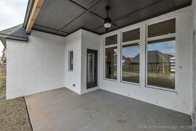 view of patio featuring ceiling fan