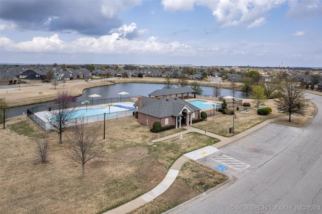 drone / aerial view featuring a water view