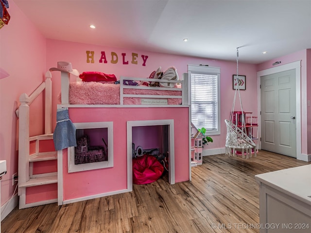 bedroom with light wood-type flooring