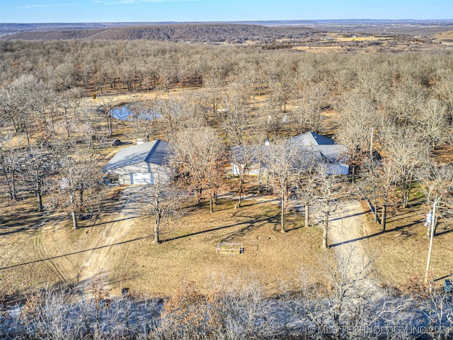 birds eye view of property featuring a rural view