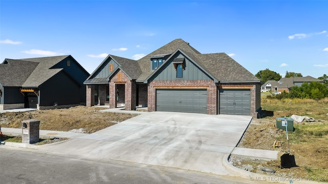 view of front of property featuring a garage