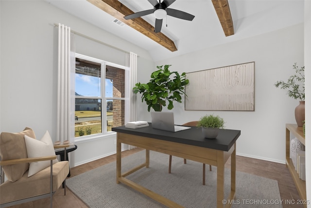 home office with dark wood-type flooring, ceiling fan, and lofted ceiling with beams