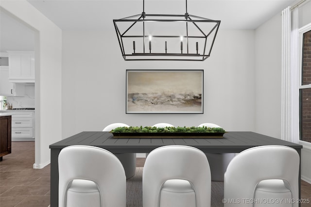 dining area with a chandelier