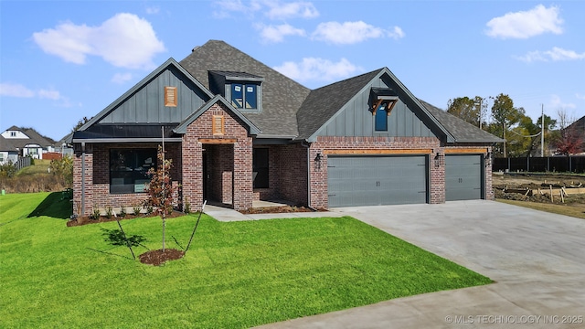 view of front facade with a garage and a front yard