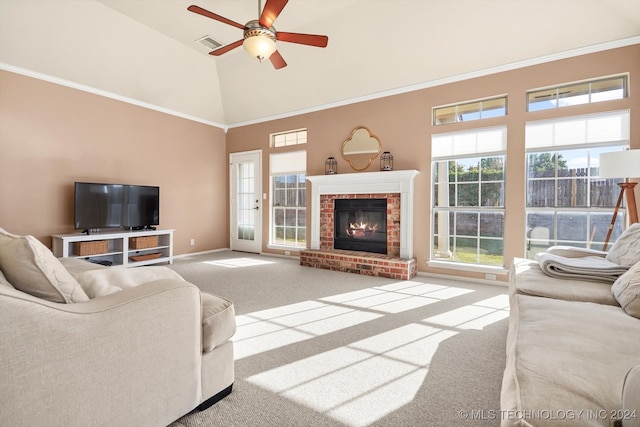 living room featuring light carpet, a fireplace, high vaulted ceiling, and ceiling fan